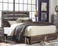 Drystan King Panel Bed with 2 Storage Drawers with Mirrored Dresser, Chest and Nightstand